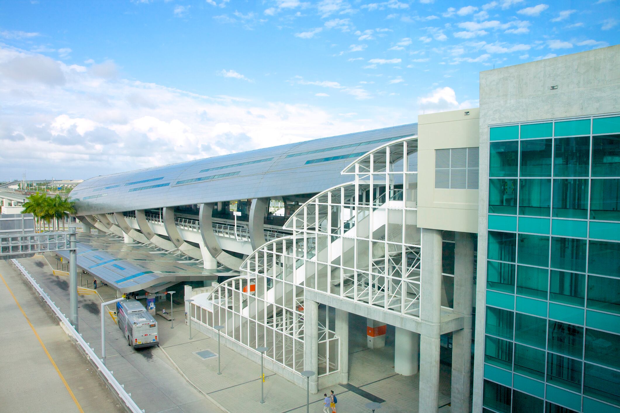 Miami Central Station and Miami Intermodal Center, also called Miami Airport Station, a rapid transit, commuter rail, intercity rail, and intercity bus transportation hub, Miami, Dade County, Florida, USA.  Metrorail and Metrobus stations are combined in a single structure designed by Perez & Perez Architects Planners Inc. Stainless steel and aluminum canopy was designed through modern digital fabrication techniques.