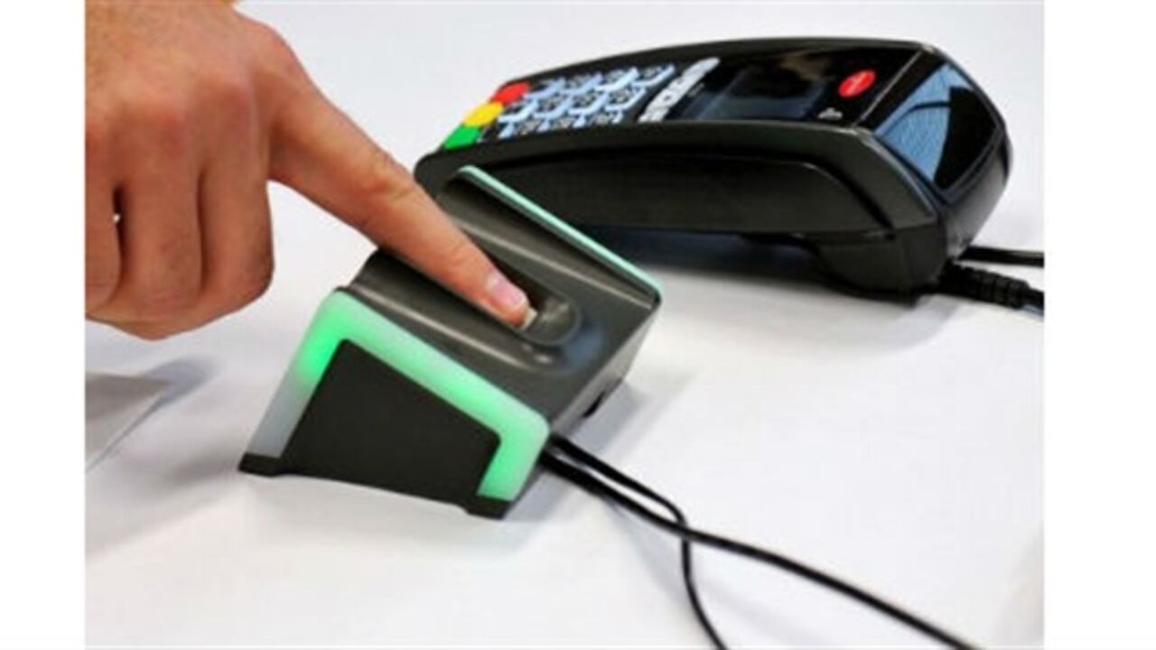 Un dispositivo de reconocimiento de las huellas dactilares para el pago automático.