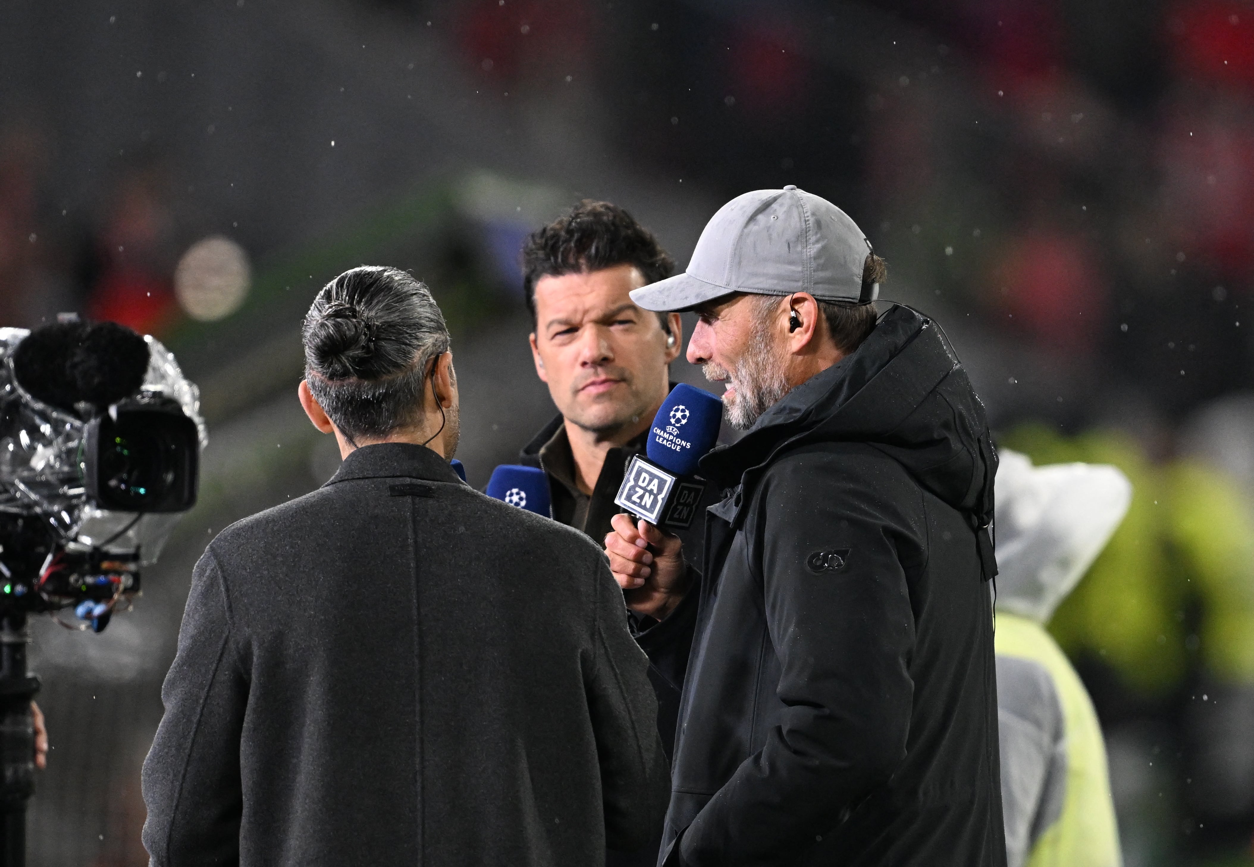 21 October 2026, Bavaria, Munich: Soccer, Men: Champions League, Group Stage, Matchday 3, Bayern Munich vs. Arsenal. German national team coach Jürgen Klopp (right) gives an interview during halftime. Photo: Sven Hoppe/dpa (Photo by Sven Hoppe/picture alliance via Getty Images)