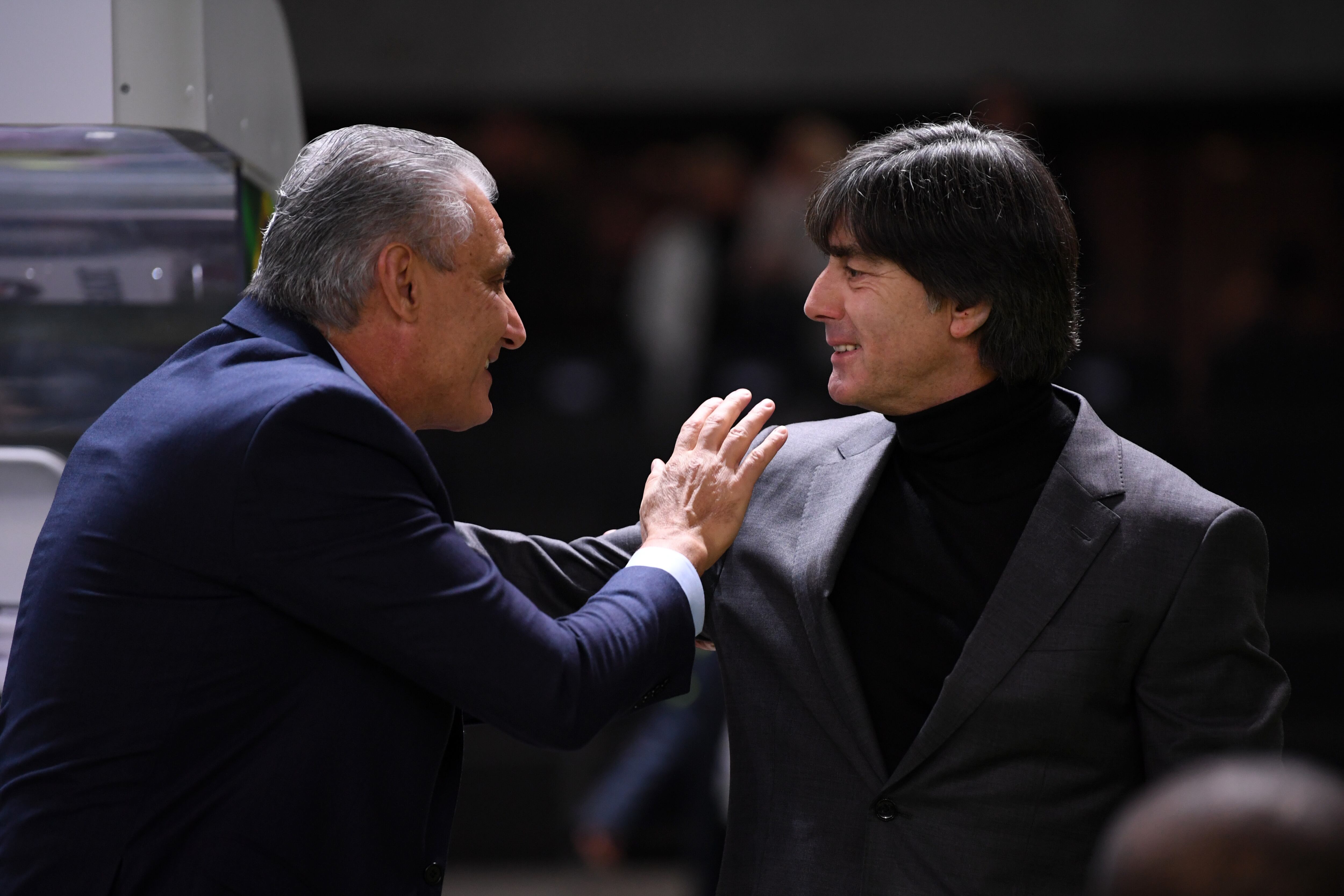 BERLIN, GERMANY - MARCH 27:  Tite, Manager of Brazil, greets Joachim Low, Manager of Germany prior to the International friendly between Germany and Brazil at Olympiastadion on March 27, 2018 in Berlin, Germany.  (Photo by Matthias Hangst/Bongarts/Getty Images)