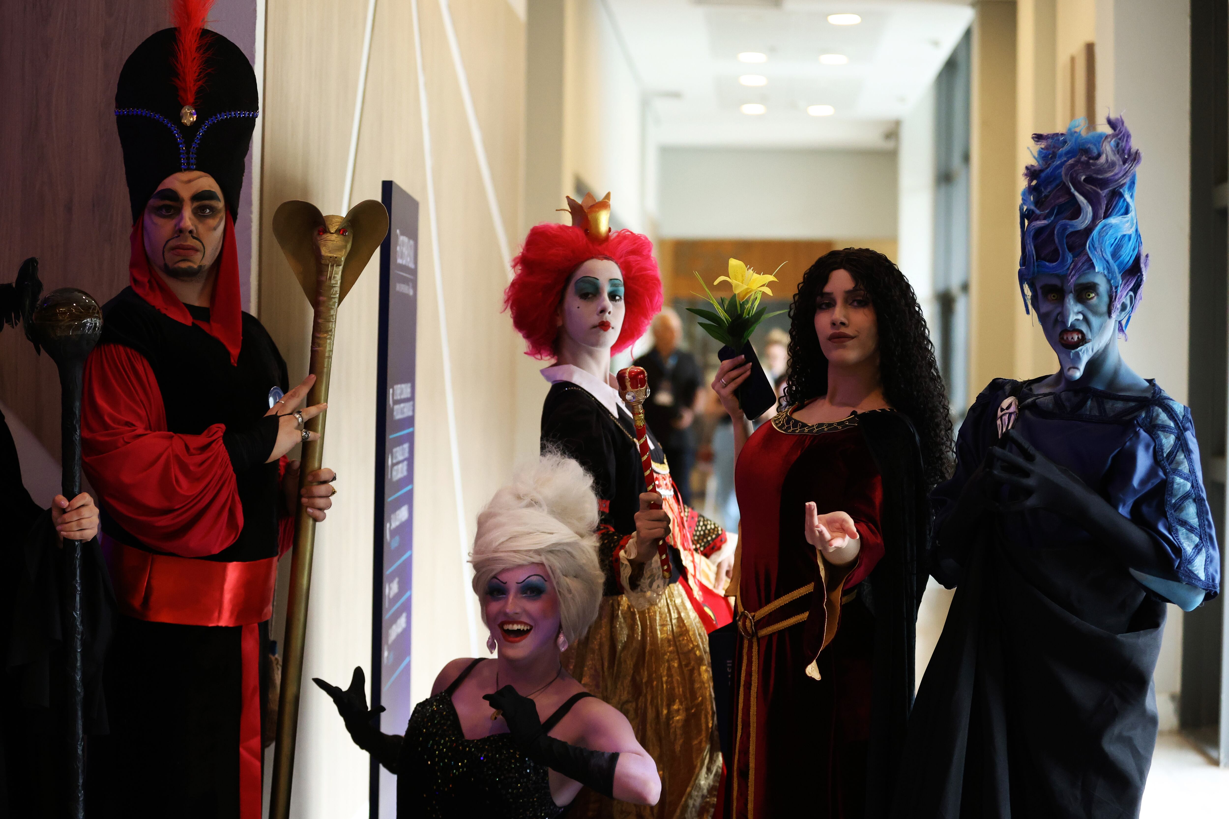 SAO PAULO, BRAZIL - NOVEMBER 09: Guests in cosplay pose during Day 2 of the D23 Brazil: A Disney Experience at Transamerica Expo Center on November 09, 2024 in Sao Paulo, Brazil.  (Photo by Ricardo Moreira/Getty Images for Disney)