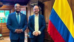 Luis Gilberto Murillo y Juan González.