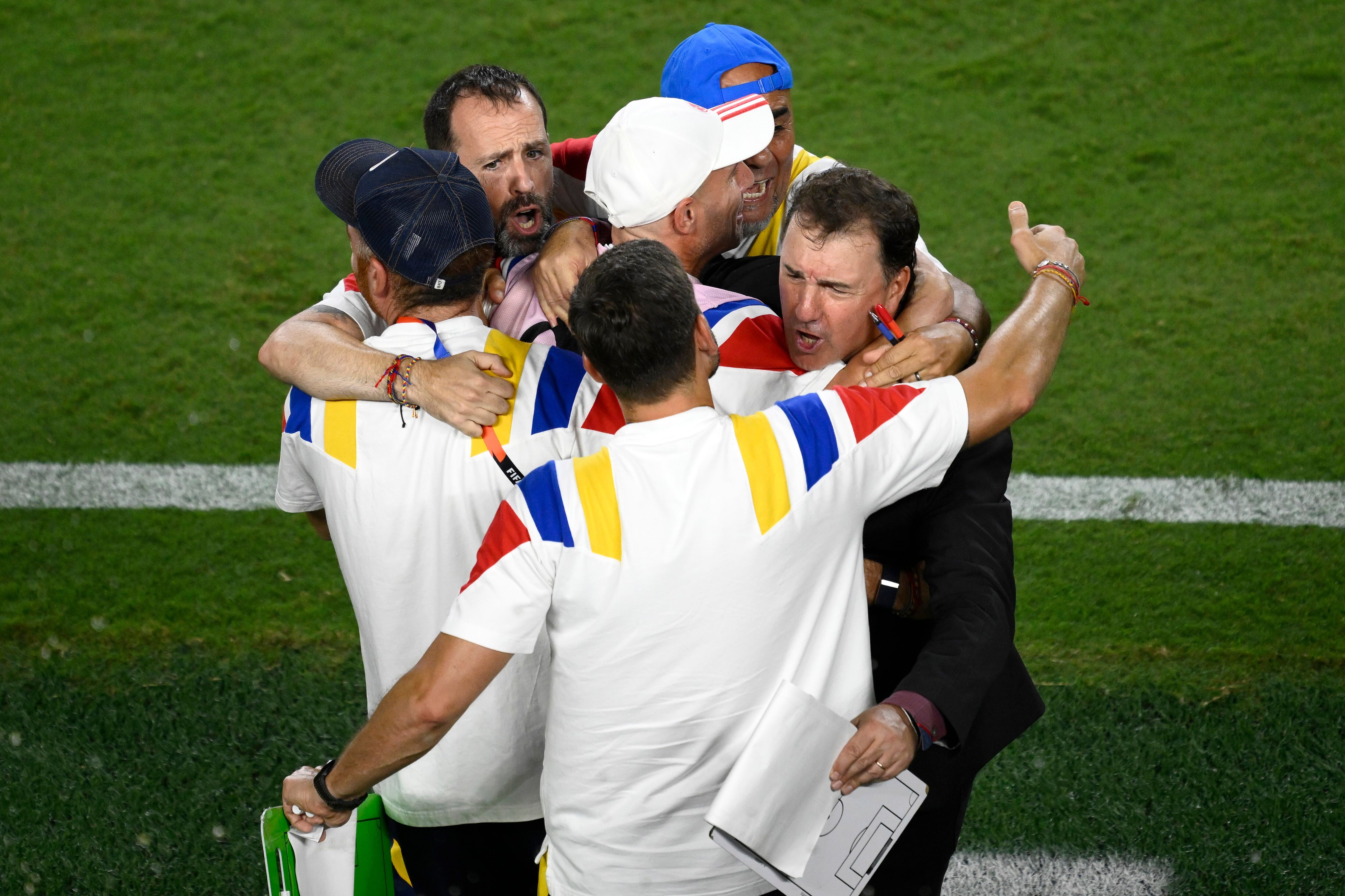 Colombia head coach Nestor Lorenzo, right, celebrates after the World Cup round of 32 soccer match between Colombia and Ghana in Kansas City, Mo., Friday, July 3, 2026. (AP Photo/Reed Hoffmann)