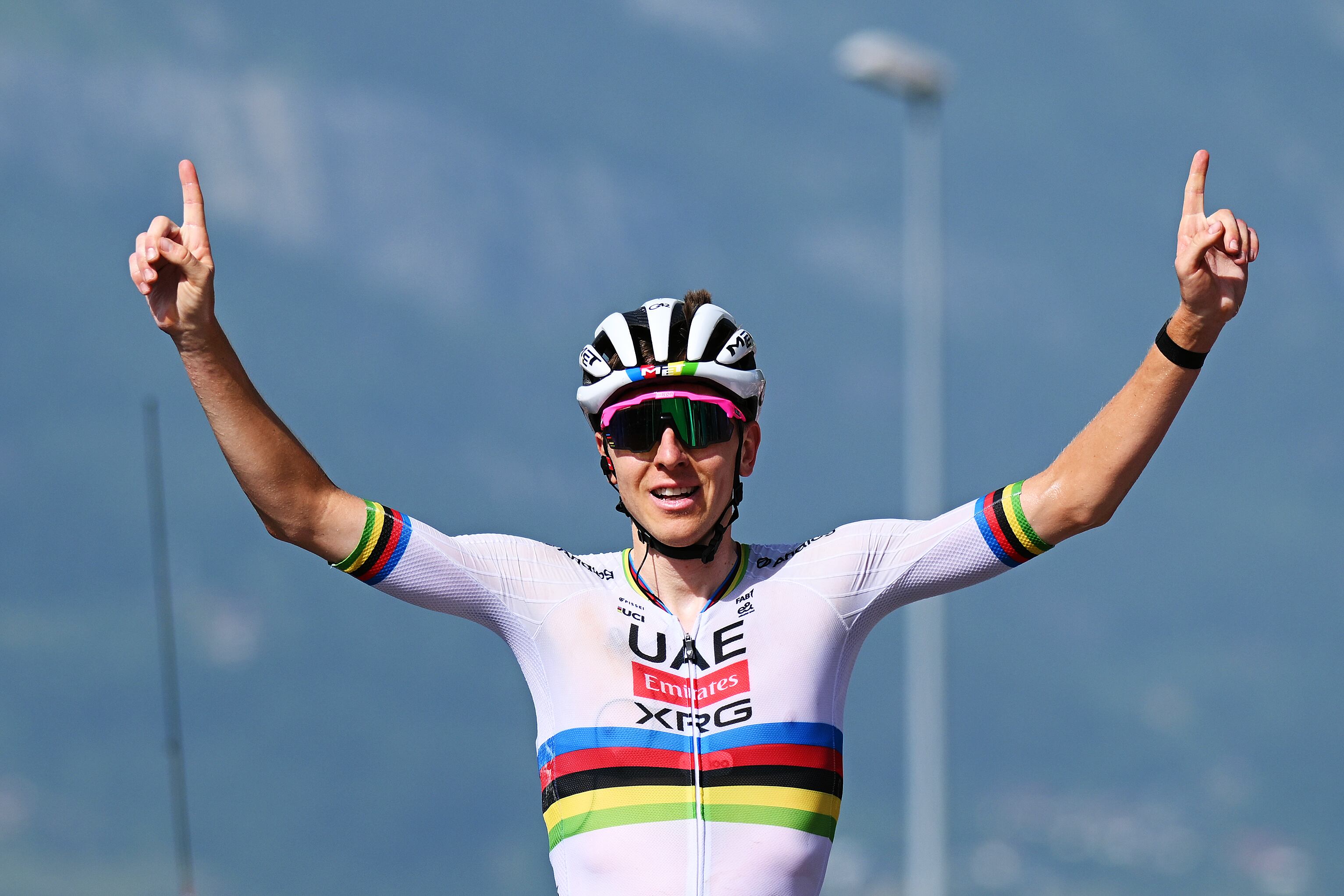 COMBLOUX, FRANCE - JUNE 13: (EDITOR'S NOTE: Alternate crop) Tadej Pogacar of Slovenia and UAE Team Emirates - XRG celebrates at finish line as stage winner during the 77th Criterium du Dauphine 2025, Stage 6 a 126.7km stage from Valserhone to Combloux 1183m / #UCIWT / on June 13, 2025 in Combloux, France. (Photo by Dario Belingheri/Getty Images)