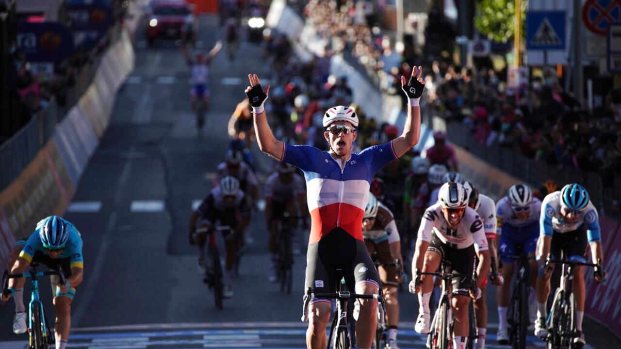 France's Arnaud Demare celebrates crossing the finish line to win the sixth stage of the Giro d'Italia cycling race, from Castrovillari to Matera, southern Italy, Thursday, Oct. 8, 2020. (Gian Mattia D'Alberto/LaPresse via AP)