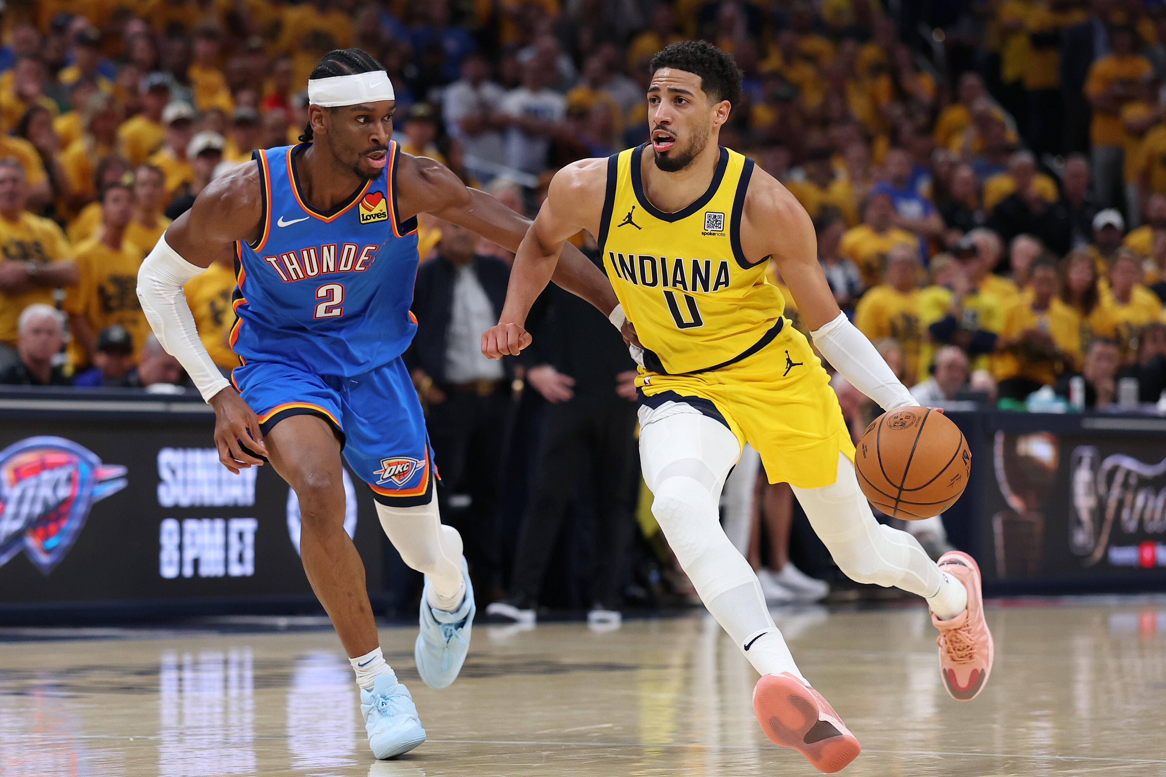 INDIANAPOLIS, INDIANA - JUNE 19:  Tyrese Haliburton #0 of the Indiana Pacers is defended by Shai Gilgeous-Alexander #2 of the Oklahoma City Thunder during the second quarter in Game Six of the 2025 NBA Finals at Gainbridge Fieldhouse on June 19, 2025 in Indianapolis, Indiana. NOTE TO USER: User expressly acknowledges and agrees that, by downloading and or using this photograph, User is consenting to the terms and conditions of the Getty Images License Agreement. (Photo by Maddie Meyer/Getty Images)