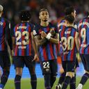 Soccer Football - LaLiga - FC Barcelona v Real Betis - Camp Nou, Barcelona, Spain - April 29, 2023 FC Barcelona's Raphinha celebrates scoring their third goal with teammates REUTERS/Albert Gea