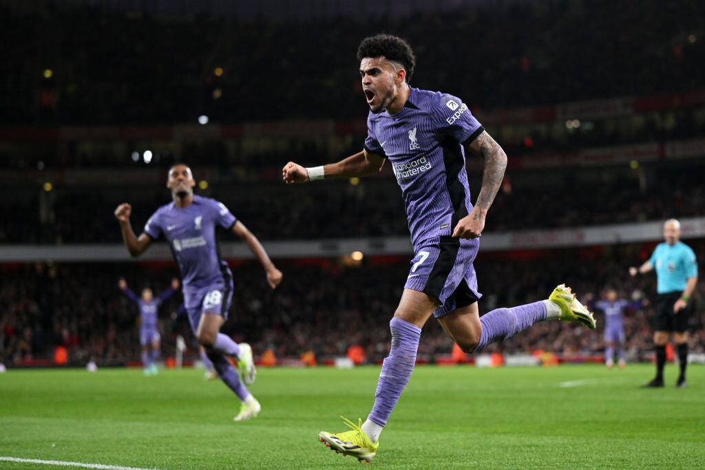 LONDON, ENGLAND - FEBRUARY 04: Luis Diaz of Liverpool celebrates his team's first goal, an own-goal scored by Gabriel of Arsenal (not pictured), during the Premier League match between Arsenal FC and Liverpool FC at Emirates Stadium on February 04, 2024 in London, England. (Photo by Shaun Botterill/Getty Images)