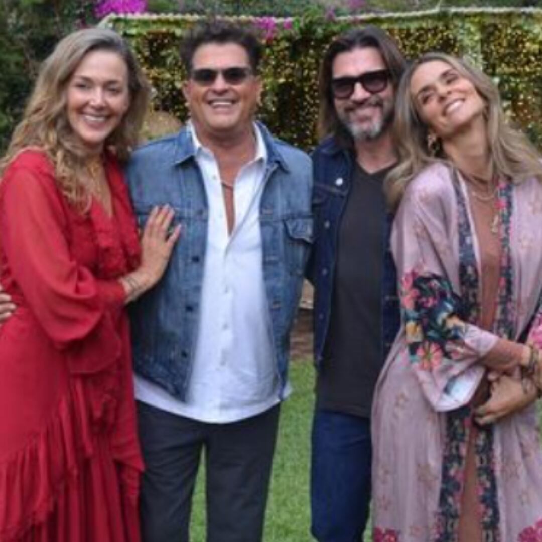 Juanes y Carlos Vives al lado de sus esposas.