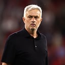BUDAPEST, HUNGARY - MAY 31: Jose Mourinho, Head Coach of AS Roma, removes their runners up medal after collecting it from Aleksander Ceferin, President of UEFA, (not pictured) after defeat to Sevilla FC in the penalty shoot out during the UEFA Europa League 2022/23 final match between Sevilla FC and AS Roma at Puskas Arena on May 31, 2023 in Budapest, Hungary. (Photo by Naomi Baker/Getty Images)