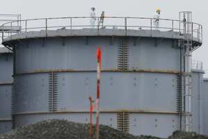 (FILES) This file handout picture released by Tokyo Electric Power Company (TEPCO) and received via Jiji Press on March 21, 2011 shows black smoke rising from reactor number three at the Fukushima Dai-ichi nuclear power plant at Okuma, Fukushima prefecture. Some 12 years after one of the world's worst nuclear disasters, Japan's premier said on August 22, 2023 the release of cooling water from the crippled Fukushima nuclear plant into the Pacific will begin on August 24, despite opposition from fishermen and protests by China. (Photo by Handout / various sources / AFP) / - Japan OUT / -----EDITORS NOTE --- RESTRICTED TO EDITORIAL USE - MANDATORY CREDIT "AFP PHOTO / TEPCO via JIJI PRESS " - NO MARKETING - NO ADVERTISING CAMPAIGNS - DISTRIBUTED AS A SERVICE TO CLIENTS