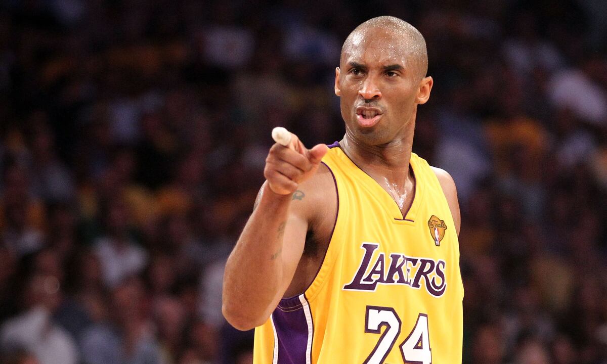 LOS ANGELES, CA - JUNE 17: Kobe Bryant #24 of the Los Angeles Lakers points in the second quarter of Game Seven of the 2010 NBA Finals against the Boston Celtics at Staples Center on June 17, 2010 in Los Angeles, California. NOTE TO USER: User expressly acknowledges and agrees that, by downloading and/or using this Photograph, user is consenting to the terms and conditions of the Getty Images License Agreement. (Photo by Getty Images/Ronald Martinez)