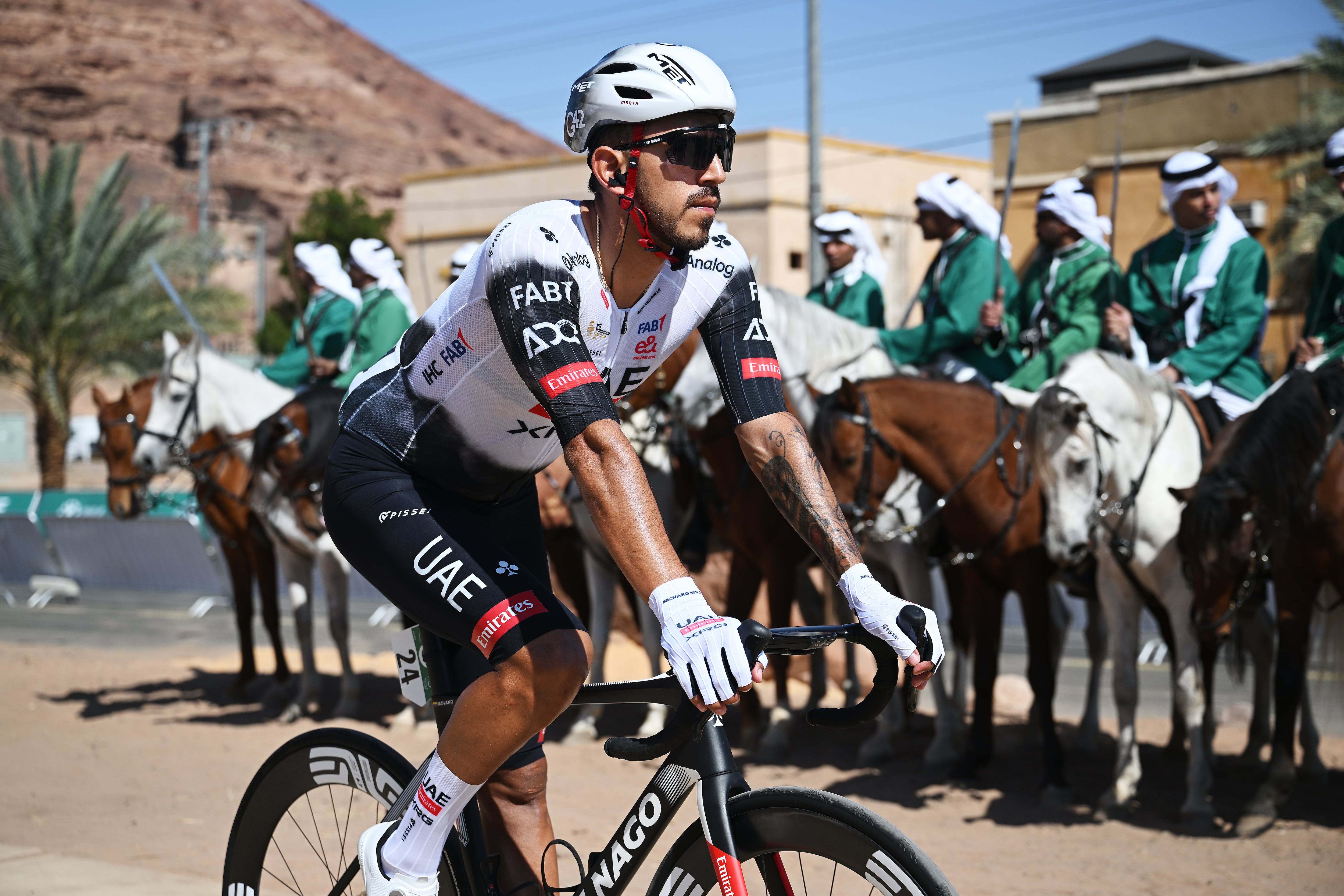 AL MANSHIYAH, SAUDI ARABIA - JANUARY 28: Juan Sebastian Molano of Colombia and UAE Team Emirates XRG prior to the 5th AlUla Tour 2025 - Stage 1 a 142,7 km stage from Al Manshiyah Train Station to Al Manshiyah Train Station on January 28, 2025 in Al Manshiyah, Saudi Arabia. (Photo by Szymon Gruchalski/Getty Images)