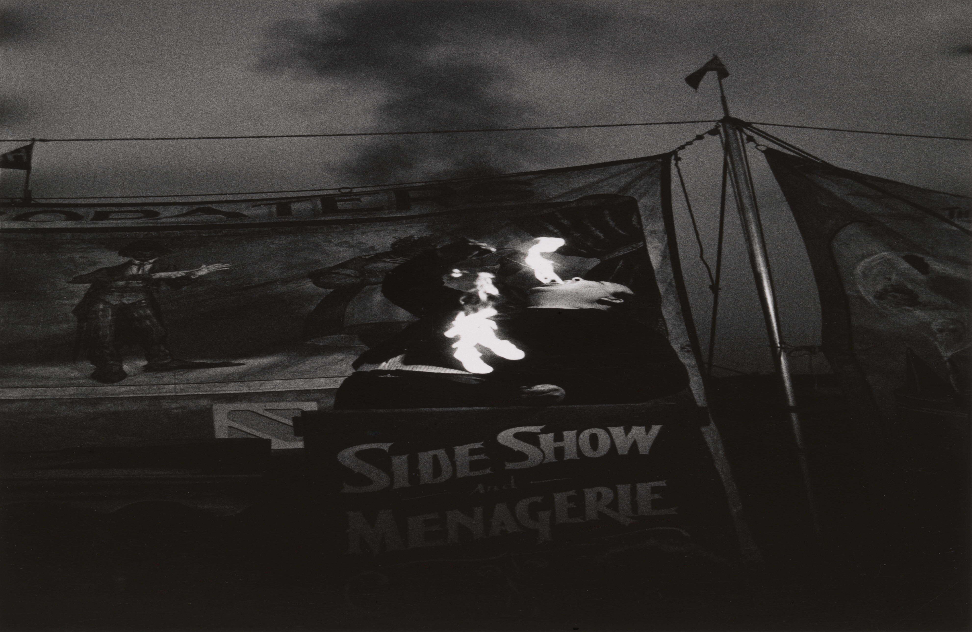 Fire Eater at a carnival, Palisades Park, N.J. 1957. © The Estate of Diane Arbus, LLC. All Rights Reserved.