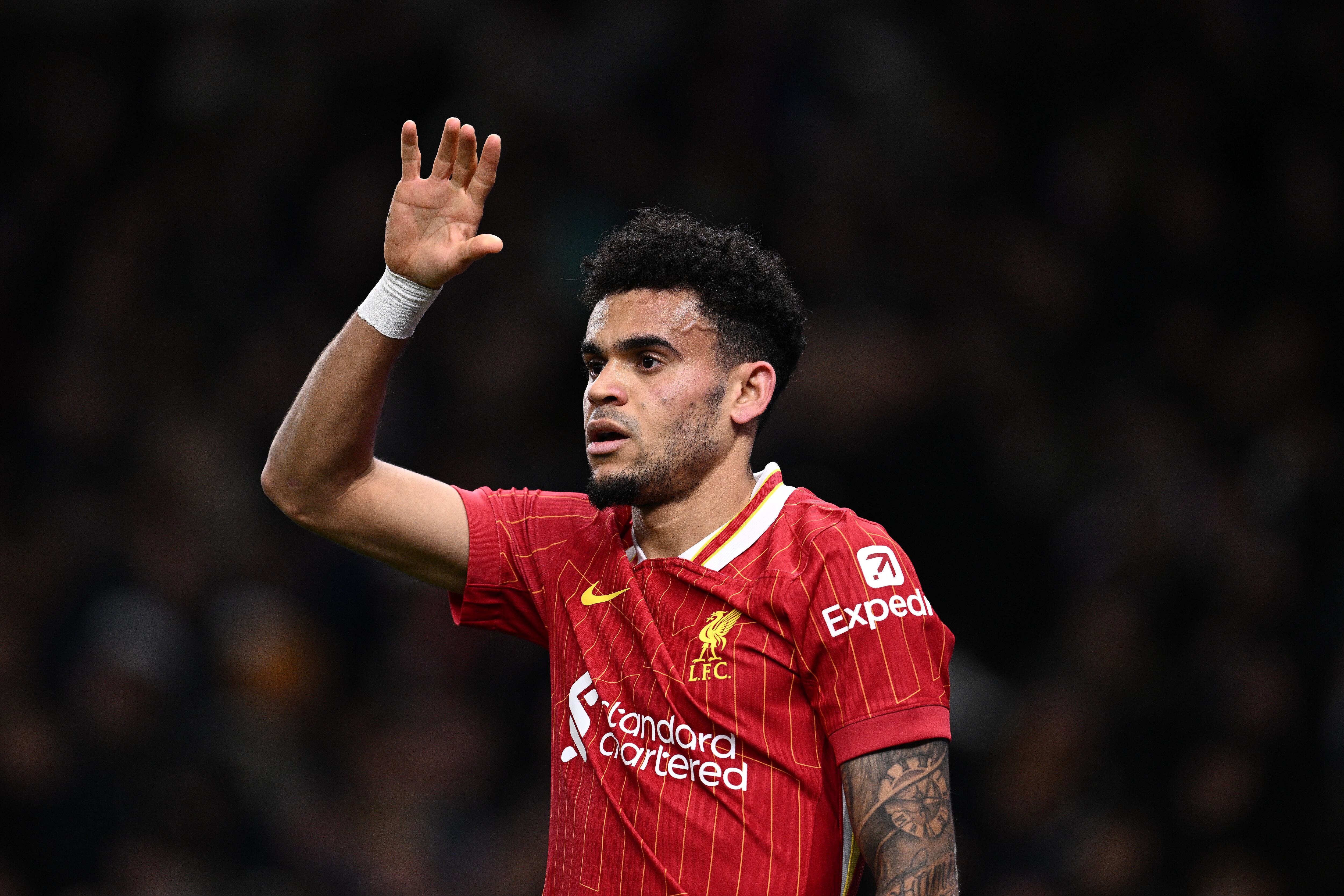 LONDON, ENGLAND - DECEMBER 22: Luis Diaz of Liverpool FC celebrates after scoring opening goal during the Premier League match between Tottenham Hotspur FC and Liverpool FC at Tottenham Hotspur Stadium on December 22, 2024 in London, England. (Photo by Sebastian Frej/MB Media/Getty Images)