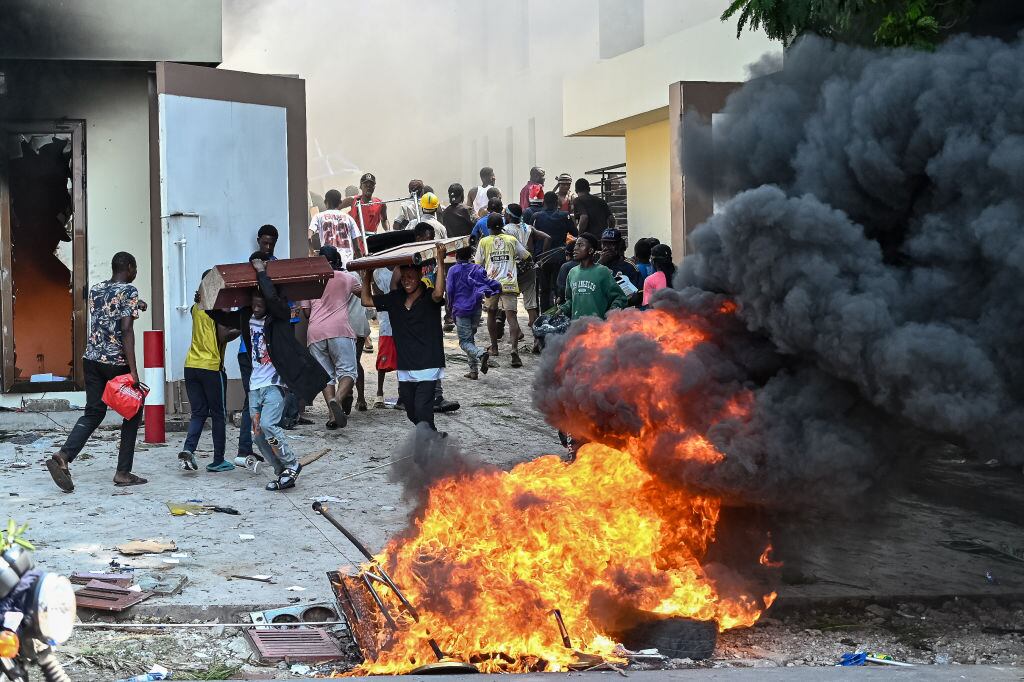 KINSHASA, DEMOCRATIC REPUBLIC OF CONGO - JANUARY 28: M23 rebels gather for large-scale protests as they set on fire the Rwandan, French, Belgian and Kenyan embassy buildings and loot some shopping centers during anti-Rwandan demonstrations allegedly supported by the rebel group March 23 Movement (M23) and rebels in Kinshasa, the capital of the Democratic Republic of Congo on January 28, 2025. (Photo by Chris Milosi/Anadolu via Getty Images)