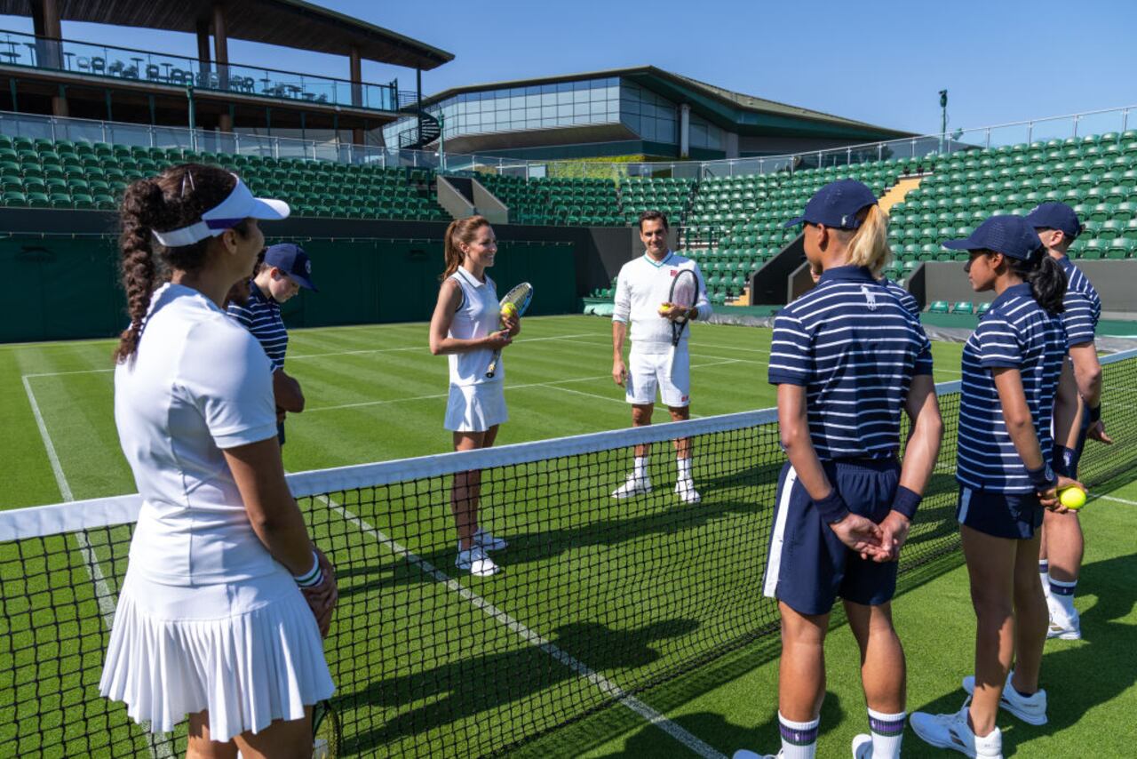 LONDON, ENGLAND - JUNE 24: In this handout images released by Kensington Palace on June 24, 2023, Catherine, Princess of Wales and Wimbledon Champion Roger Federer playing tennis on No.3 Court at The All England Lawn Tennis Club, Wimbledon, on June 8, 2023 in London, England. (Photo by Handout/Thomas Lovelock - AELTC via Getty Images)