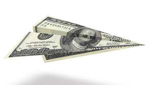 Avión de cien dólares aislado sobre fondo blanco.