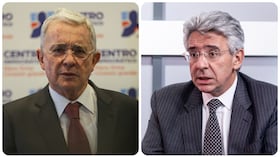El expresidente Álvaro Uribe Vélez y el senador de Salvación Nacional, enrique Gómez.