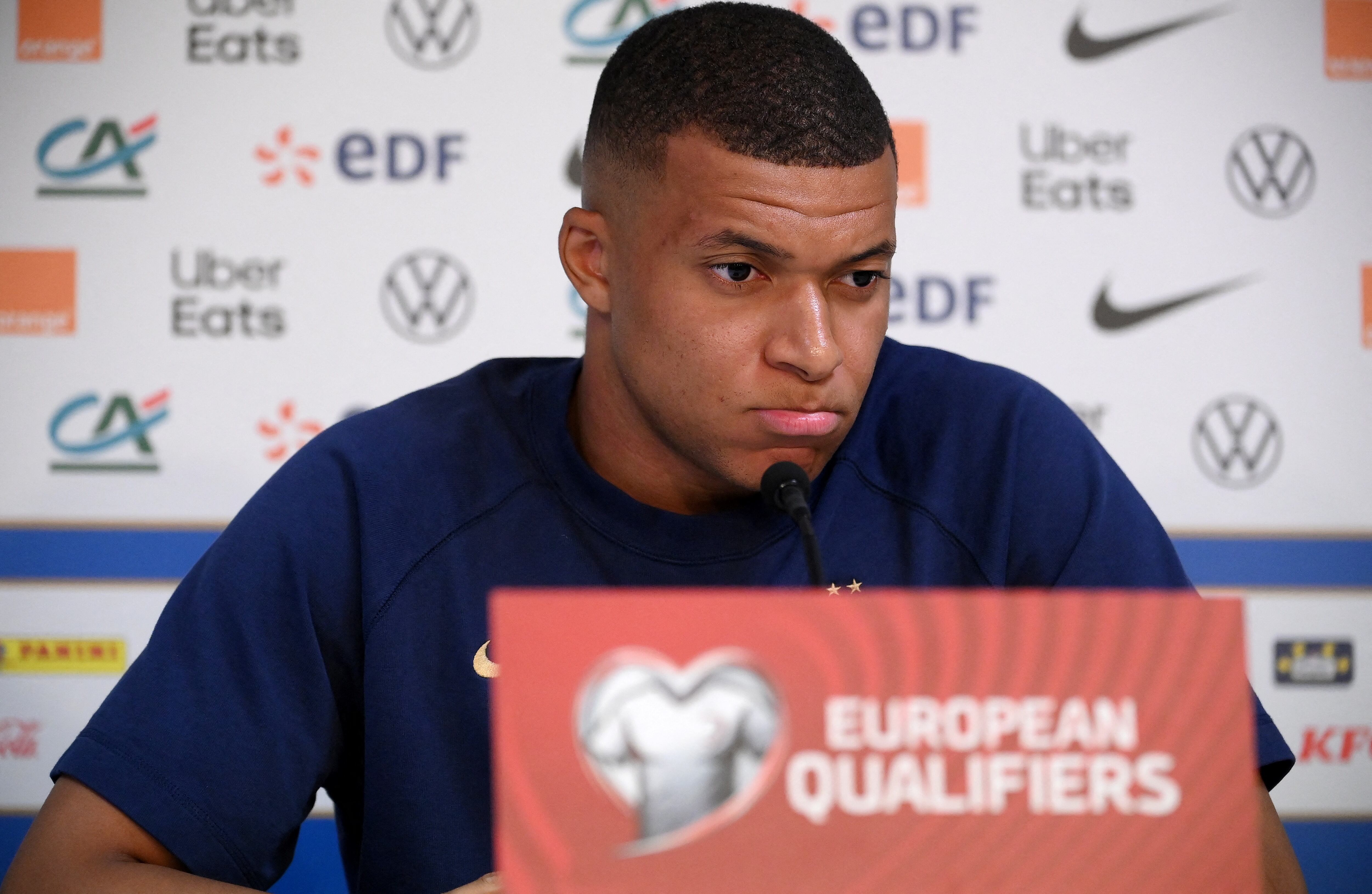 France's forward Kylian Mbappe grimaces during a press conference at the Algarve stadium, in Faro on June 15, 2023, on the eve of their UEFA Euro 2024 group B qualification football match against Gibraltar. (Photo by FRANCK FIFE / AFP)