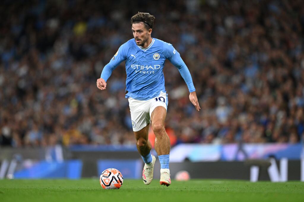 MANCHESTER, ENGLAND - AUGUST 19: Manchester City player Jack Grealish in action during the Premier League match between Manchester City and Newcastle United at Etihad Stadium on August 19, 2023 in Manchester, England. (Photo by Stu Forster/Getty Images)