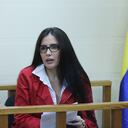 Handout photo released by the Venezuelan Ministry of Popular Power for Communication and Information press office of former Colombian Senator Aida Merlano during a hearing at the Palace of Justice in Caracas on February 6, 2020. - Merlano was detained by Venezuelan security forces in the northwestern city of Maracaibo on January 27 after illegally crossing into Venezuela. She was serving a 15-year prison sentence in Colombia for vote-buying when she staged a spectacular escape in October, giving her guards the slip while visiting a dentist. (Photo by Marcelo Garcia / Venezuelan Ministry of Communication and Information / AFP) / RESTRICTED TO EDITORIAL USE - MANDATORY CREDIT "AFP PHOTO / VENEZUELAN MINISTRY OF POPULAR POWER FOR COMMUNICATION AND INFORMATION / MARCELO GARCIA" - NO MARKETING NO ADVERTISING CAMPAIGNS - DISTRIBUTED AS A SERVICE TO CLIENTS