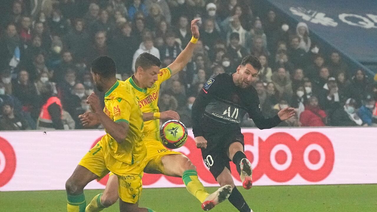 PSG's Lionel Messi scores his side's third goal during French League One soccer match between Paris Saint-Germain and Nantes at the Parc des Princes stadium in Paris, France, Saturday, Nov. 20, 2021. (AP Photo/Michel Euler)