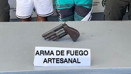 Arma de cuatro cartuchos