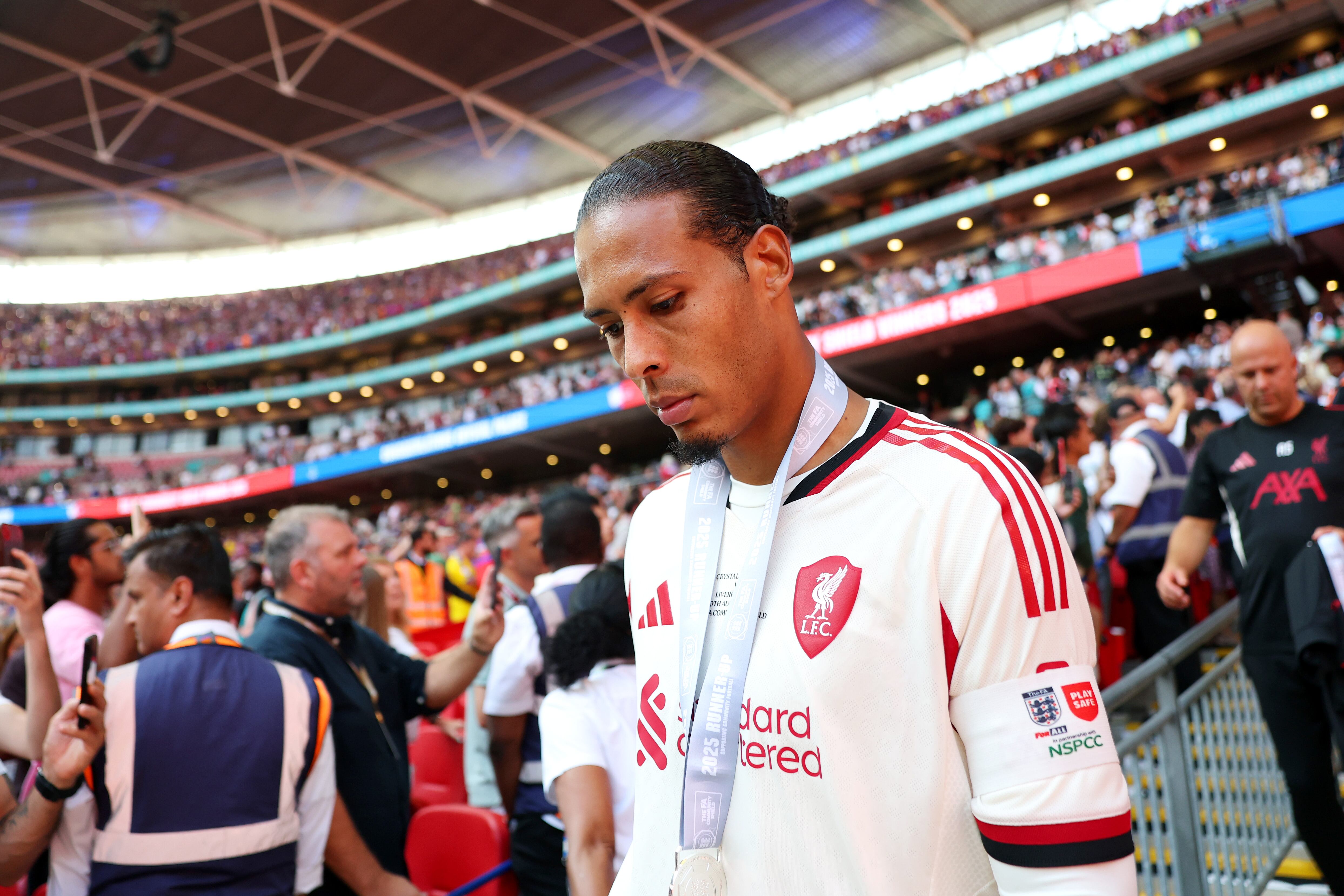 LONDON, ENGLAND - AUGUST 10: Virgil van Dijk of Liverpool looks dejected while wearing his runners up medal after the teams defeat in the 2025 FA Community Shield match between Crystal Palace and Liverpool at Wembley Stadium on August 10, 2025 in London, England. (Photo by Michael Regan - The FA/The FA via Getty Images)