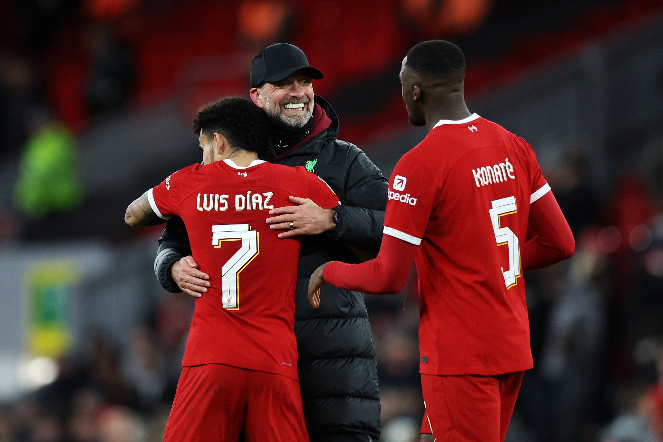 LIVERPOOL, ENGLAND - JANUARY 10: Juergen Klopp, Manager of Liverpool, Luis Diaz and Ibrahima Konate of Liverpool celebrate following the team's victory in the Carabao Cup Semi Final First Leg match between Liverpool and Fulham at Anfield on January 10, 2024 in Liverpool, England. (Photo by Clive Brunskill/Getty Images)
