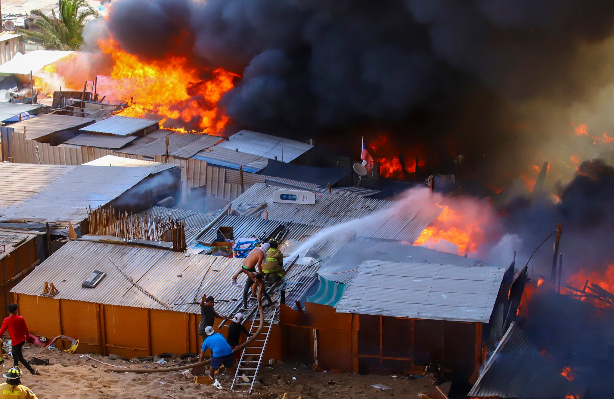 incendio en barrio de migrantes en Chile