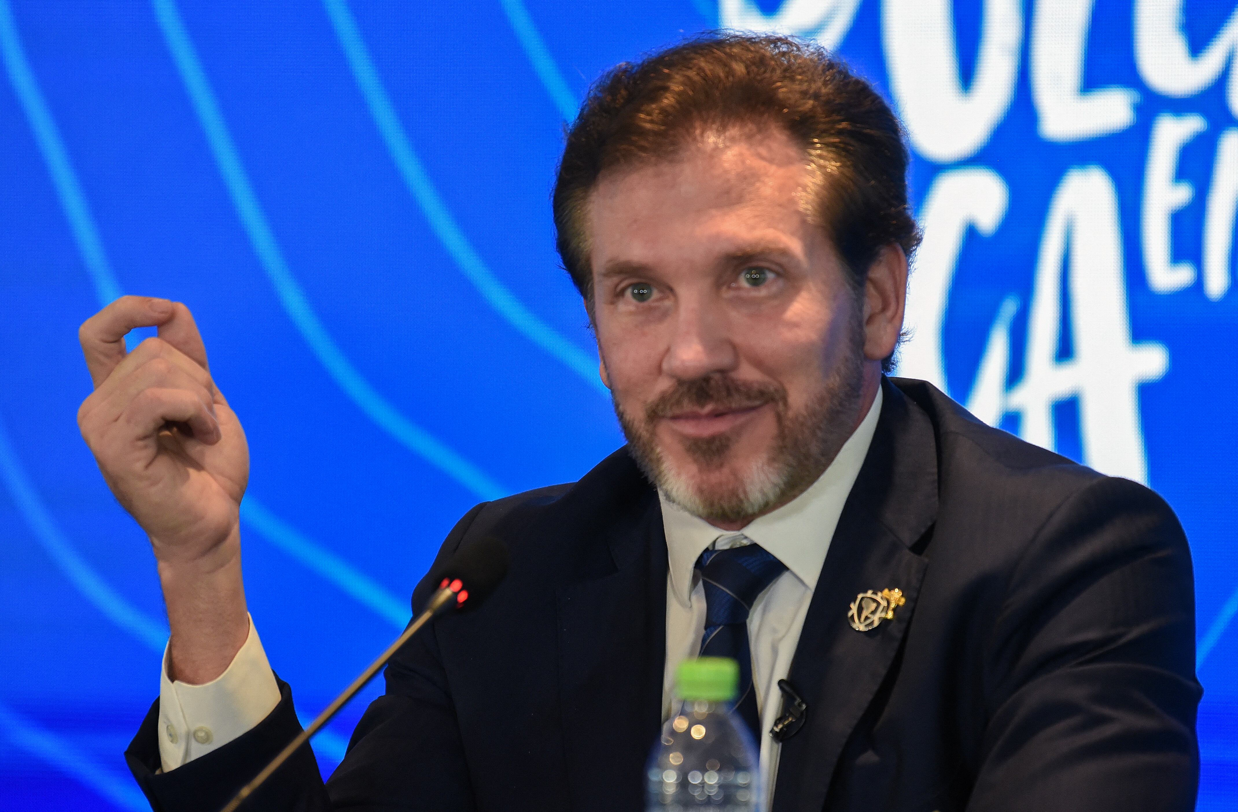 Conmebol President Alejandro Dominguez announces in a press conference in Luque, Paraguay, on October 4, 2023, that the "inaugural matches" of the 2030 World Cup will be played in Uruguay, Argentina and Paraguay, as it emerged that the host country for the tournament will be shared between Spain, Portugal and Morocco. Morocco, Portugal and Spain will be joint hosts for the 2030 World Cup but games will also be played in Uruguay, Argentina and Paraguay, FIFA announced on October 4. FIFA said in a statement that the matches in South America were part of the celebration of the centenary of the first World Cup in Uruguay. The statement said a "centenary ceremony" will be held "at the stadium where it all began", in Montevideo's Estadio Centenario in 1930. (Photo by Norberto DUARTE / AFP)