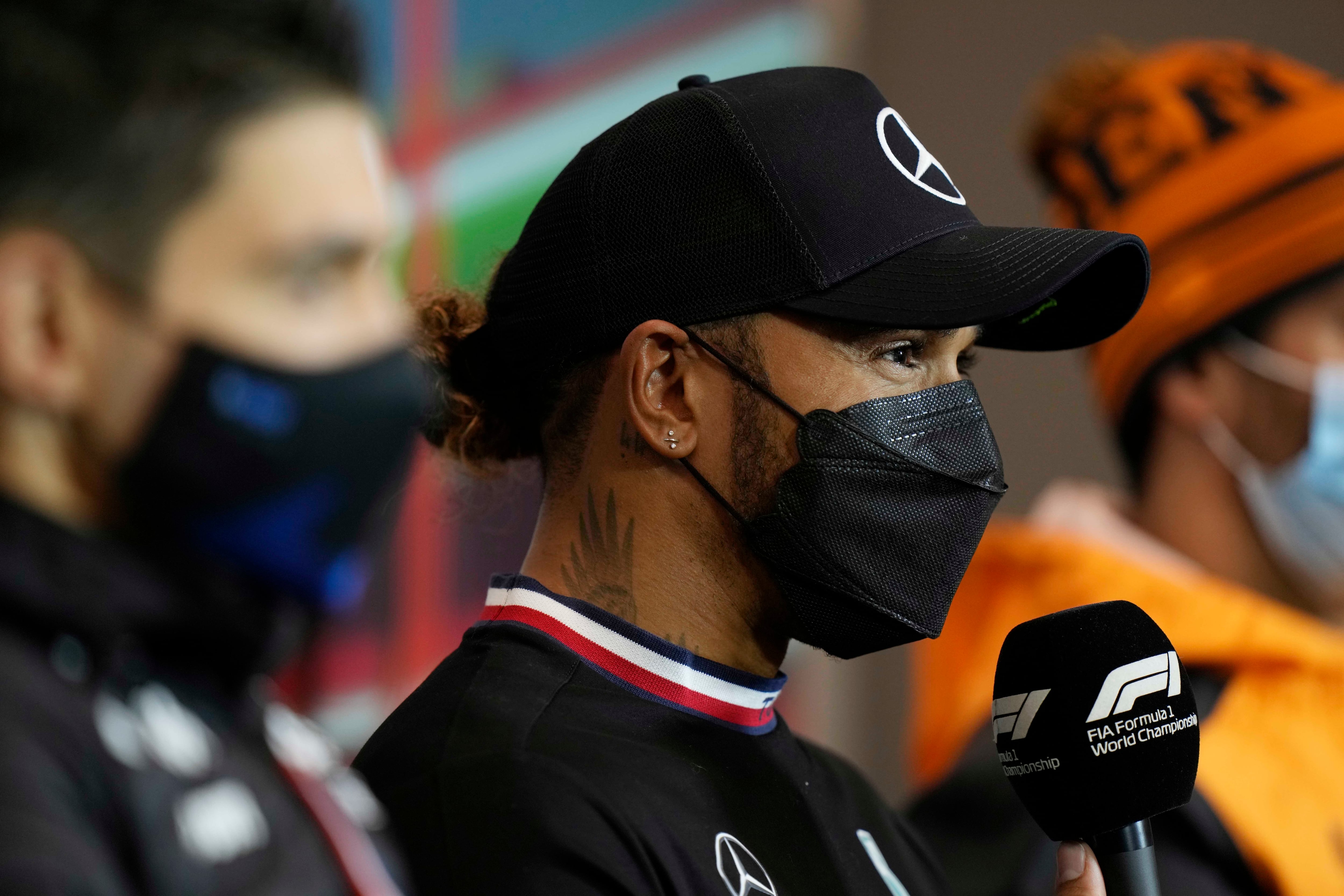 Mercedes driver Lewis Hamilton of Britain answers to reporters during a news conference prior to the start of the free practice at the Dino and Enzo Ferrari racetrack, in Imola, Italy, Friday, April 22, 2022. The Italy's Emila Romagna Formula One Grand Prix will be held on Sunday.(AP Photo/Luca Bruno)