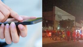 Fiscalía revisa el celular de uno de los presuntos sicarios capturados.