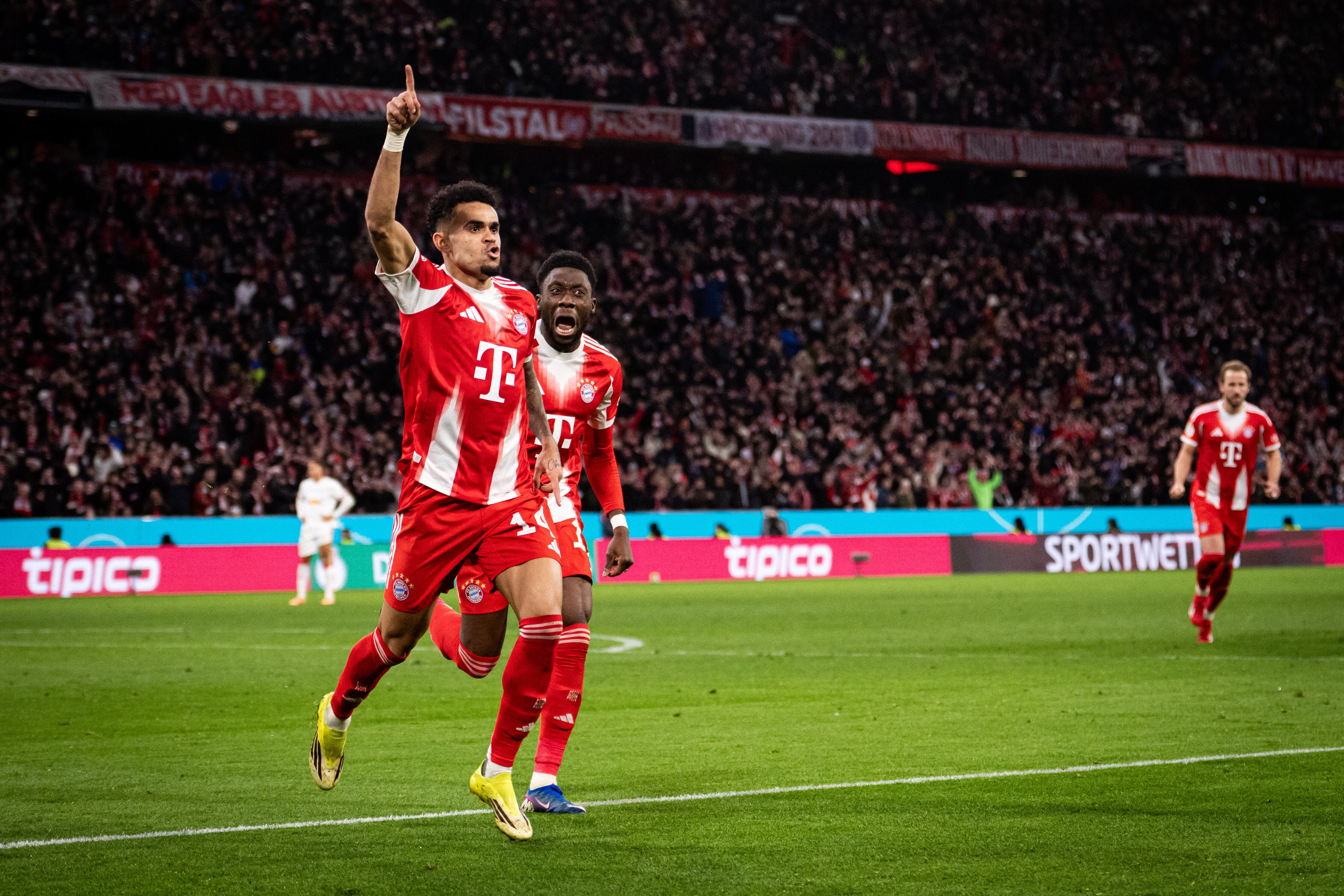 MUNICH, GERMANY - FEBRUARY 11: Luis Diaz and Alphonso Davies of FC Bayern Muenchen celebrate the second goal during the DFB Cup Quarter Final match between FC Bayern München and RB Leipzig at Allianz Arena on February 11, 2026 in Munich, Germany. (Photo by S. Mellar/FC Bayern via Getty Images)