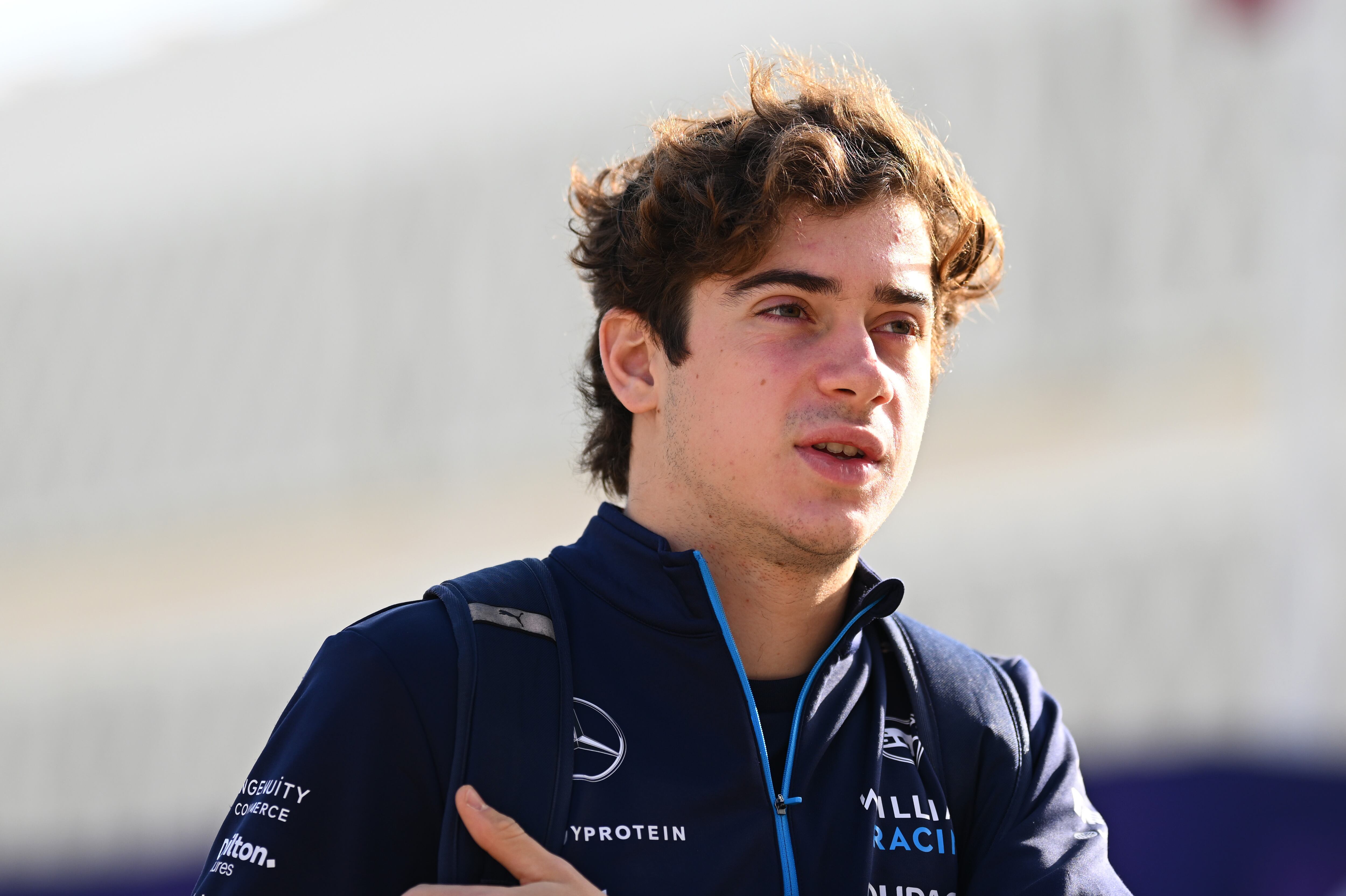 LUSAIL CITY, QATAR - NOVEMBER 30: Franco Colapinto of Argentina and Williams walks in the Paddock prior to the Sprint ahead of the F1 Grand Prix of Qatar at Lusail International Circuit on November 30, 2024 in Lusail City, Qatar. (Photo by Clive Mason/Getty Images)