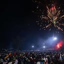 Ugandeses celebran el nuevo año en la catedral Miracle Center de Kampala, Uganda, el 1 de enero de 2023.