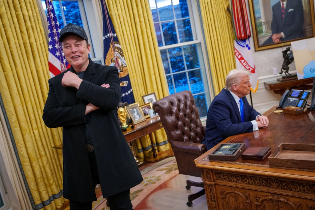 WASHINGTON, DC - FEBRUARY 11: Tesla and SpaceX CEO Elon Musk and U.S. President Donald Trump appear during an executive order signing in the Oval Office at the White House on February 11, 2025 in Washington, DC. Trump is to sign an executive order implementing the Department of Government Efficiency's (DOGE) "workforce optimization initiative," which, according to Trump, will encourage agencies to limit hiring and reduce the size of the federal government. (Photo by Andrew Harnik/Getty Images)