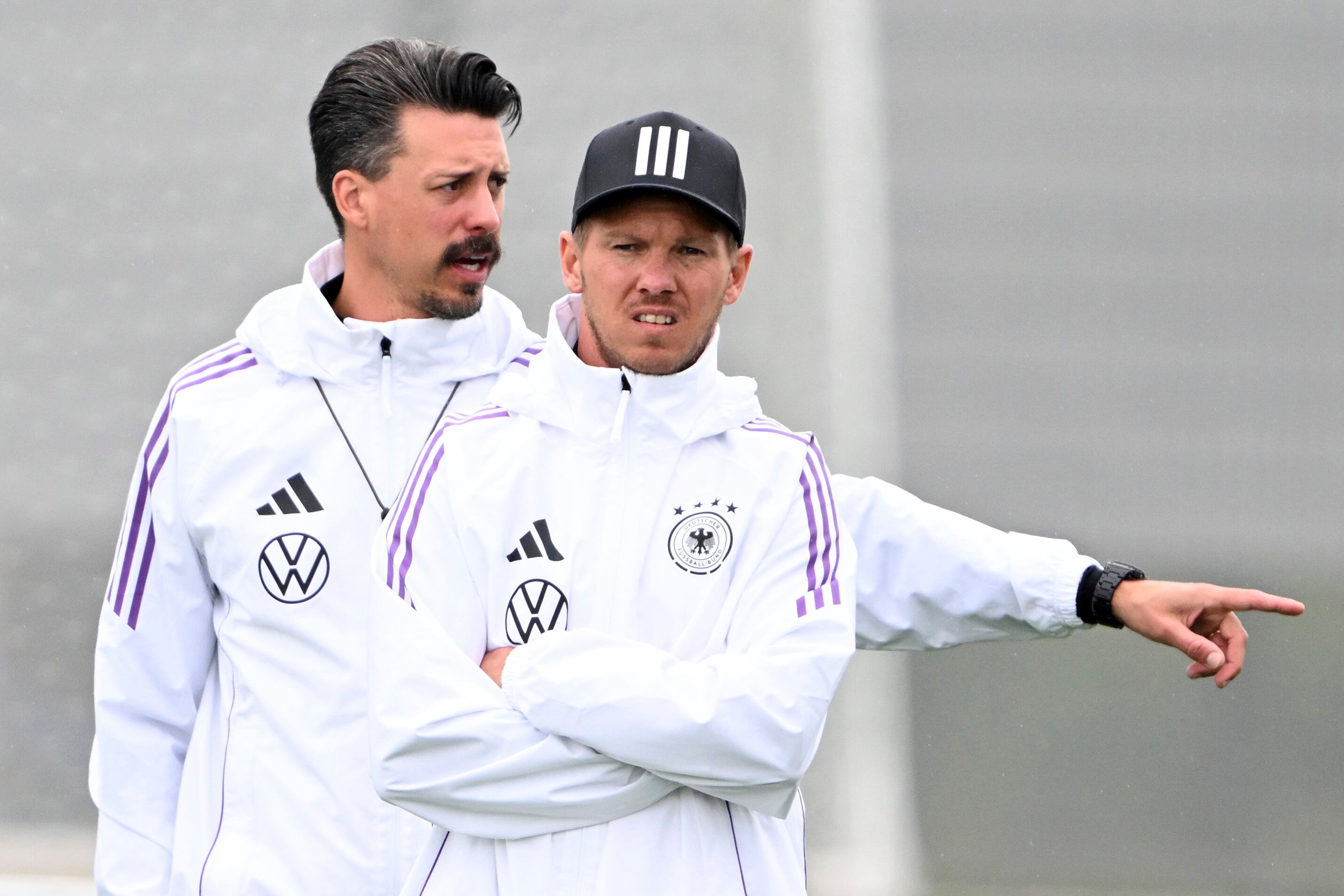 Germany's national coach Julian Nagelsmann, left, and assistant coach Sandro Wagner during  a training session of the national team, in Herzogenaurach, Germany, Saturday, June 1, 2024. (Federico Gambarini/dpa via AP)