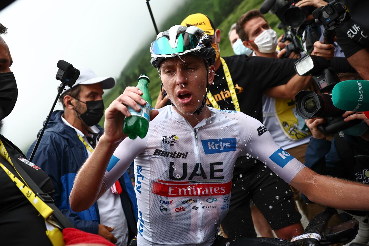 Slovenia's Tadej Pogacar cools off after winning the sixth stage of the Tour de France cycling race over 145 kilometers (90 miles) with start in Tarbes and finish in Cauterets-Cambasque, France, Thursday, July 6, 2023. (Anne-Christine Poujoulat, Pool Photo via AP)