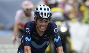 Spain's Enric Mas crosses finish line during the eleventh stage of the Tour de France cycling race over 152 kilometers (94.4 miles) with start in Albertville and finish in Col du Granon Serre Chevalier, France, Wednesday, July 13, 2022. (AP Photo/Daniel Cole)