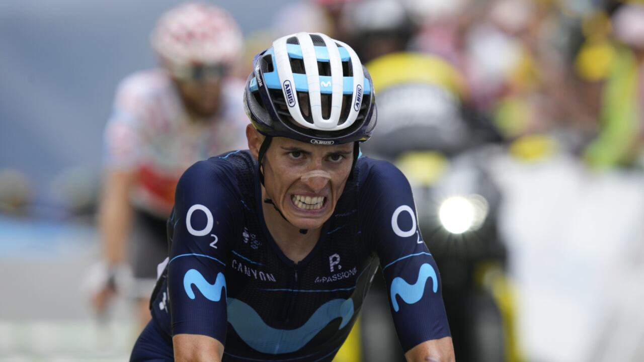 Spain's Enric Mas crosses finish line during the eleventh stage of the Tour de France cycling race over 152 kilometers (94.4 miles) with start in Albertville and finish in Col du Granon Serre Chevalier, France, Wednesday, July 13, 2022. (AP/Daniel Cole)
