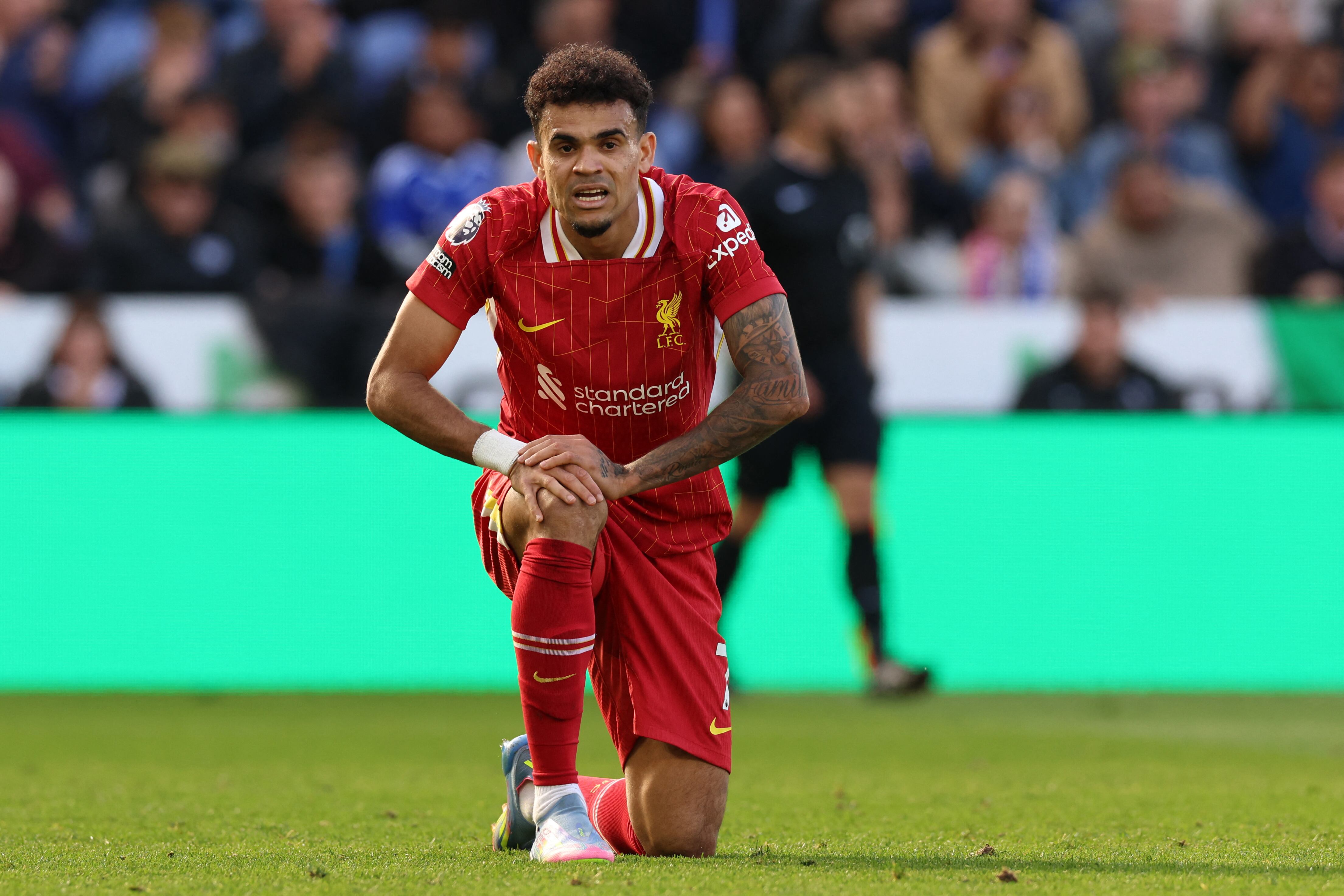 Liverpool's Colombian midfielder #07 Luis Diaz reacts to a missed chance during the English Premier League football match between Leicester City and Liverpool at King Power Stadium in Leicester, central England on April 20, 2025. (Photo by Darren Staples / AFP) / RESTRICTED TO EDITORIAL USE. NO USE WITH UNAUTHORIZED AUDIO, VIDEO, DATA, FIXTURE LISTS, CLUB/LEAGUE LOGOS OR 'LIVE' SERVICES. ONLINE IN-MATCH USE LIMITED TO 120 IMAGES. AN ADDITIONAL 40 IMAGES MAY BE USED IN EXTRA TIME. NO VIDEO EMULATION. SOCIAL MEDIA IN-MATCH USE LIMITED TO 120 IMAGES. AN ADDITIONAL 40 IMAGES MAY BE USED IN EXTRA TIME. NO USE IN BETTING PUBLICATIONS, GAMES OR SINGLE CLUB/LEAGUE/PLAYER PUBLICATIONS. /