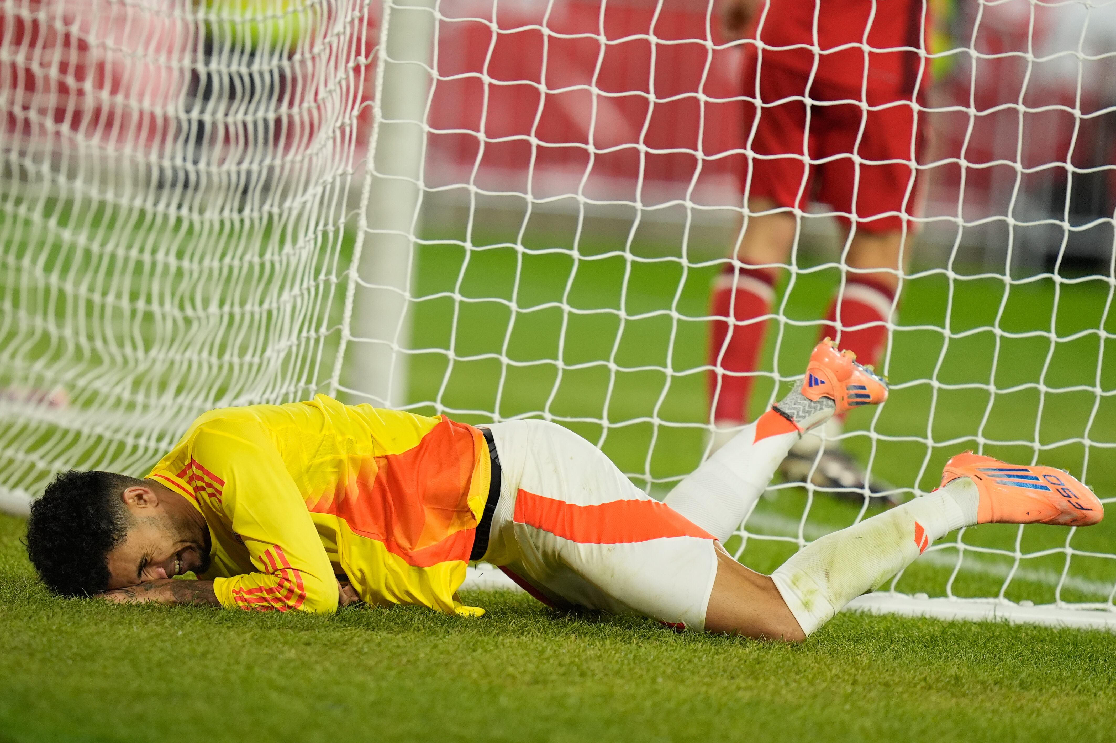 Colombia's Luis Díaz reacts after missing a goal during the second half of a friendly soccer match against Canada in Harrison, N.J., Tuesday, Oct. 14, 2025. (AP Photo/Seth Wenig)