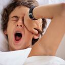 Adolescent Boy Waking Up