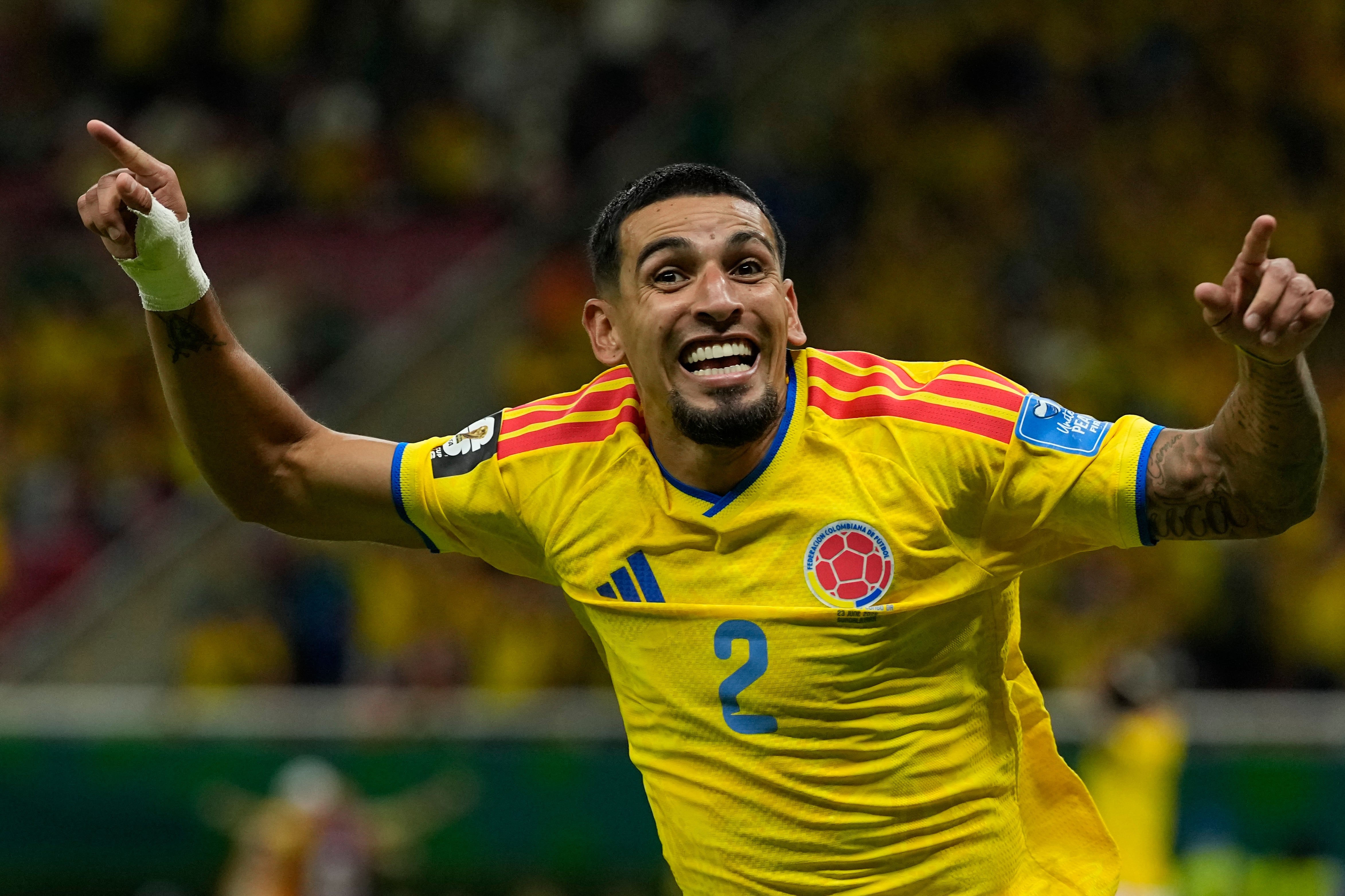Colombia's Daniel Munoz celebrates after scoring his side's opening goal during the World Cup Group K soccer match between Colombia and Congo in Zapopan, near Guadalajara, Mexico, Tuesday, June 23, 2026. (AP Photo/Ricardo Mazalan)