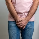 Sick man prostate cancer, prostate inflammation, premature ejaculation, fertility, erection or bladder problem. Man with hands holding his crotch, he wants to pee - urinary incontinence concept