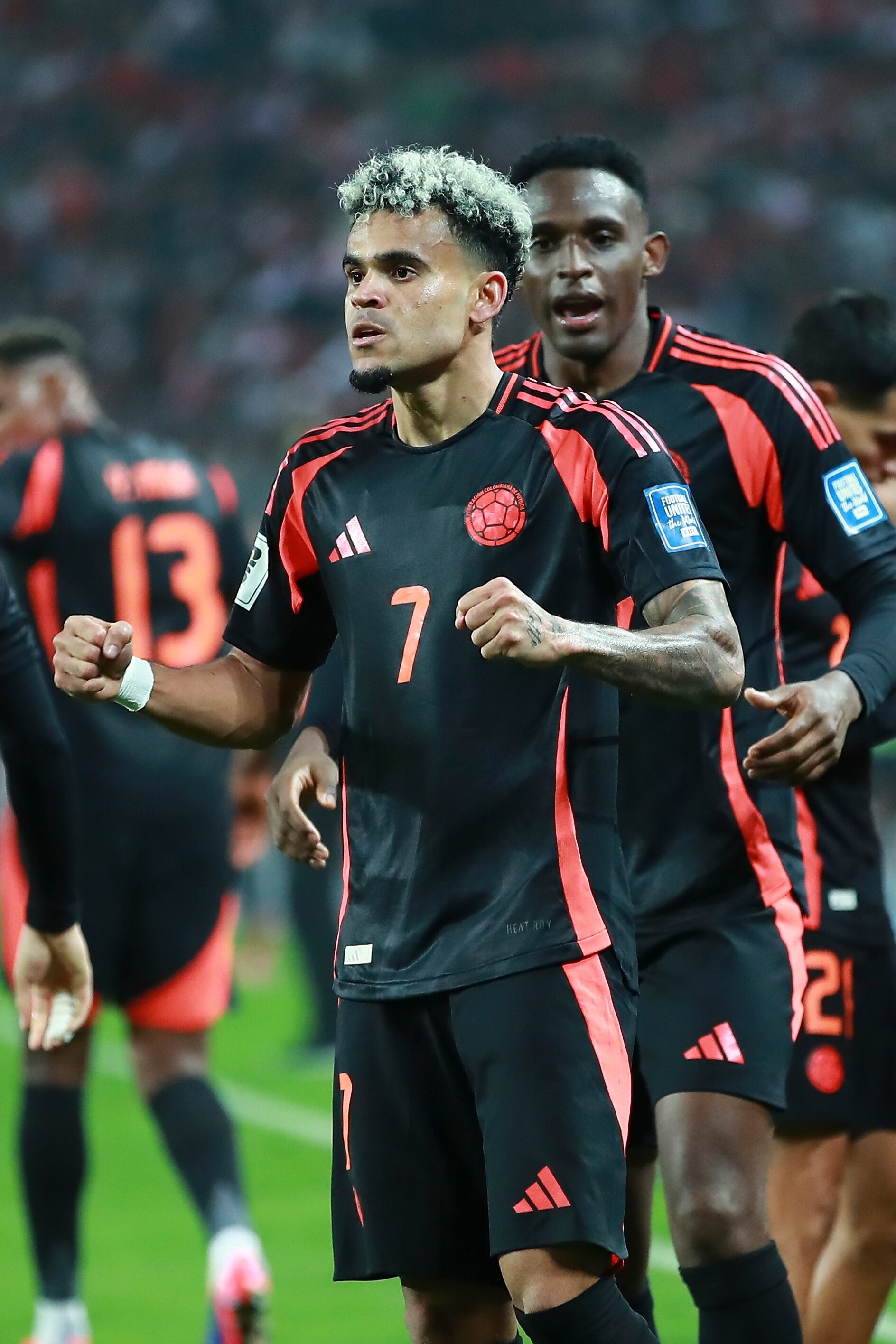 Colombia's Luis Diaz celebrates scoring his side's opening goal against Peru during a qualifying soccer match for the FIFA World Cup 2026 at National stadium in Lima, Peru, Friday, Sept. 6, 2024. (AP Photo/Daniel Apuy)