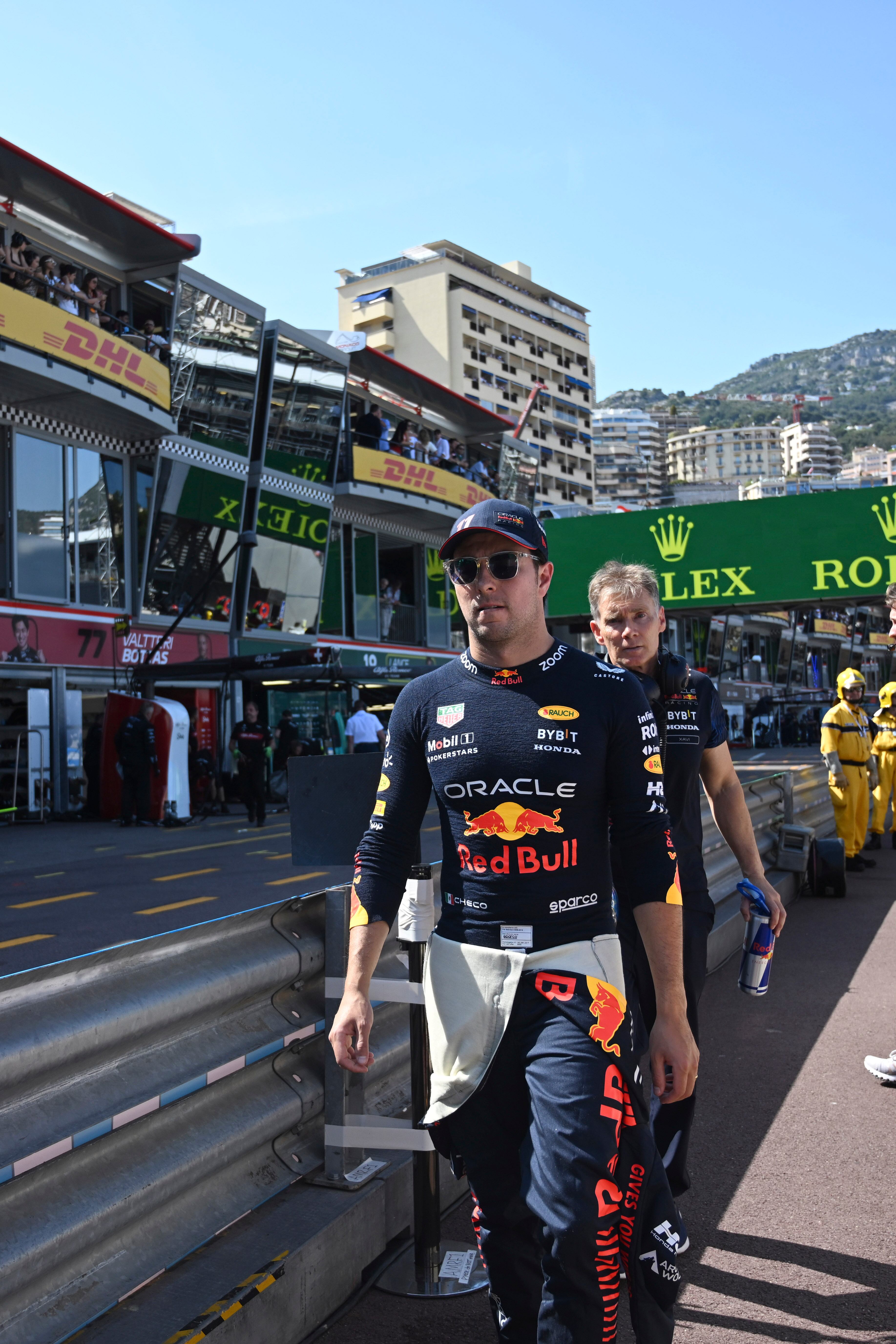 Red Bull driver Sergio Perez of Mexico walks on the side of the track after crashing out of the Formula One qualifying session, at the Monaco racetrack, in Monaco, Saturday, May 27, 2023. The Monaco Formula One race will be held on Sunday. (Photo Christian Bruna, Pool Photo Via AP)