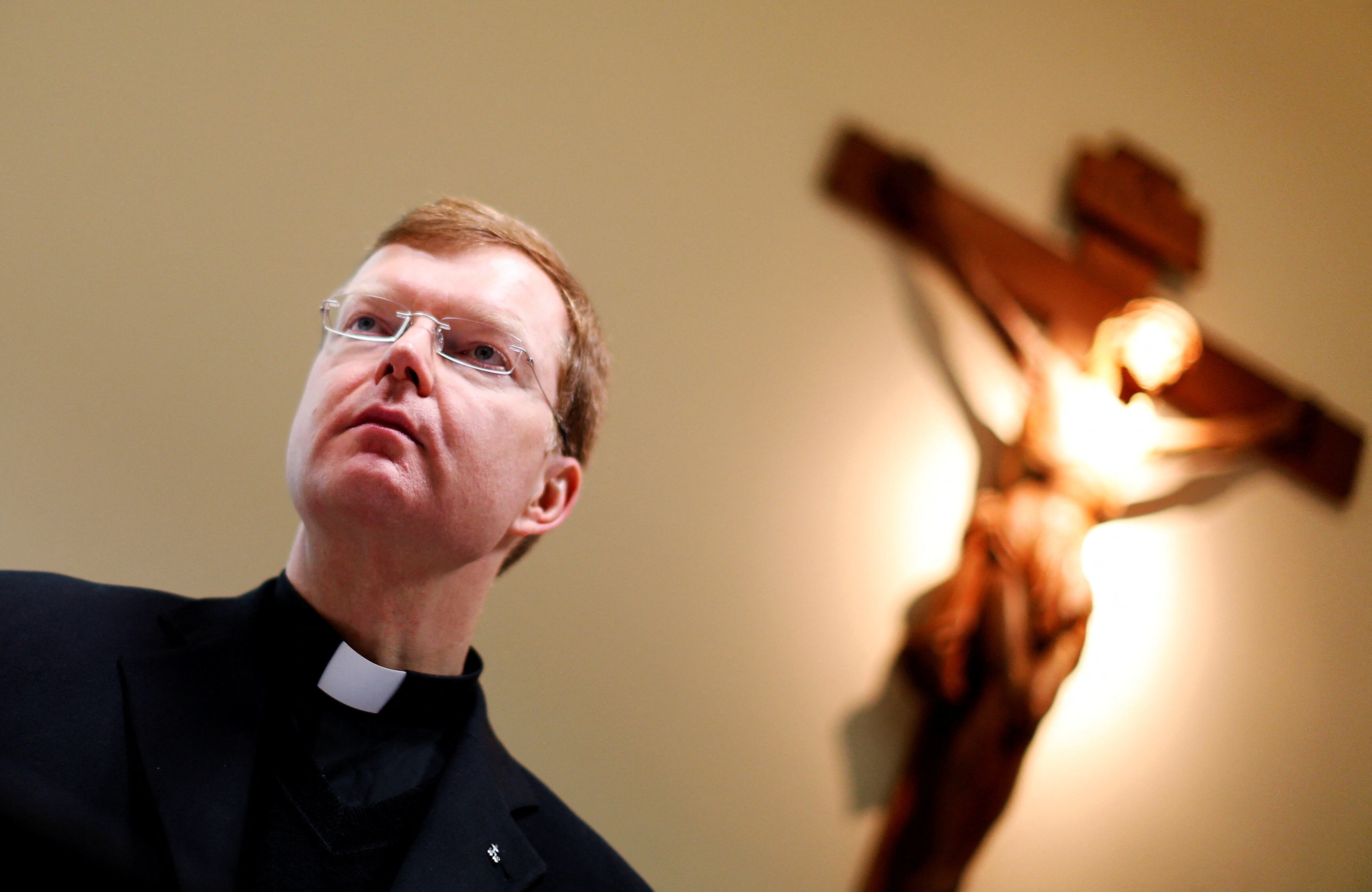 Father Hans Zollner, the Vatican's Chair of the Steering Committee of the Centre for the Protection of Minors, looks on as he attends a news conference at the Pontificial Gregorian University in Rome February 5 , 2013. Father Zollner and Father Robert Oliver were presenting the publication of the acts of a major symposium in Rome in 2012 on how the Roman Catholic Church can better protect children from sexual abuse by members of the clergy.   REUTERS/Alessandro Bianchi/File Photo